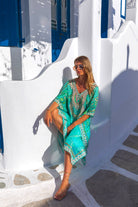 Aqua floaty silk crepe cover ups to wear ot the beach by Lindsey Brown