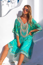 Aqua silk beach cover ups to wear to the beach by Lindsey Brown