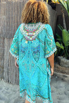 Aqua knee length silk printed resort wear kaftans in plus sizes to wear on holiday by Lindsey Brown luxury resort wear 