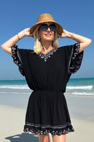 black cotton beach dress to wear on holiday by Lindsey Brown