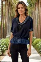 black embroidered cotton top to wear on holiday by Lindsey Brown resort wear 