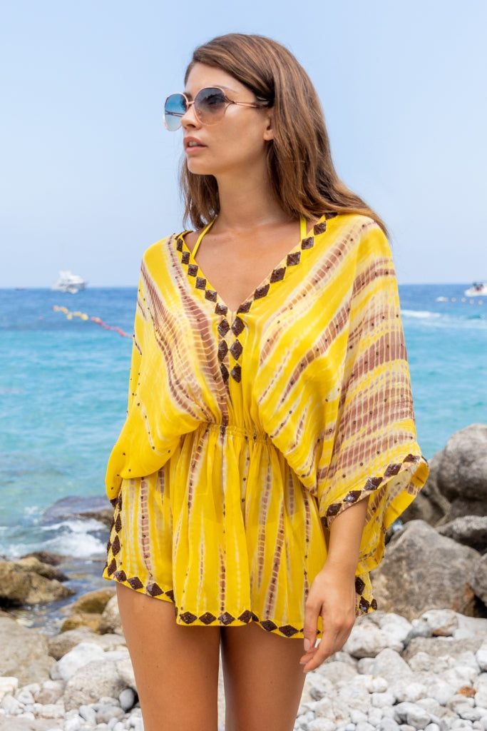 Yellow silk designer kaftans to wear on a Caribbean Cruise by Lindsey Brown resort wear