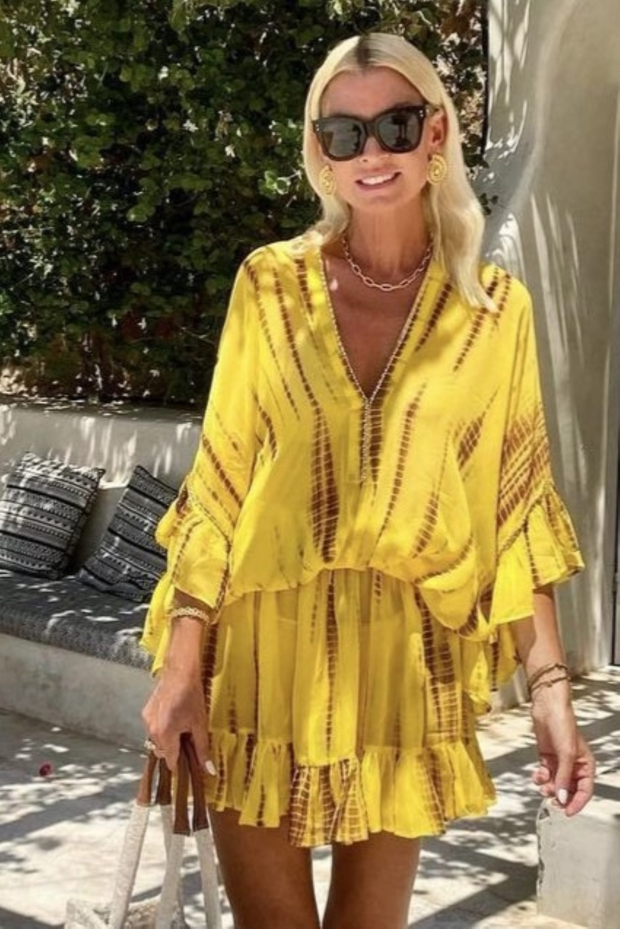 Yellow Drop waisted silk luxury resort wear kaftan dress by Lindsey Brown luxurey resort wear
