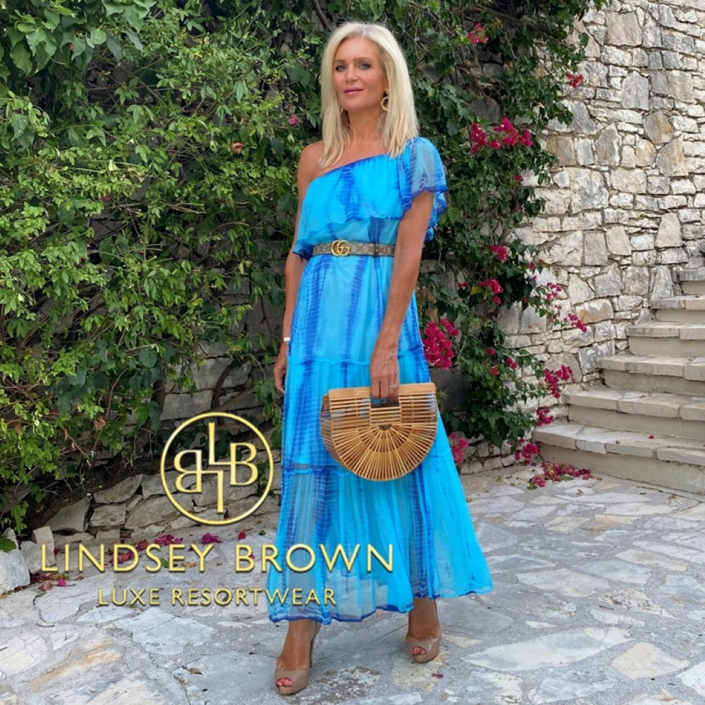 Turquoise silk designer off the shoulder silk holiday dresses to wear in Santorini and Mykonos by Lindsey Brown resort wear 